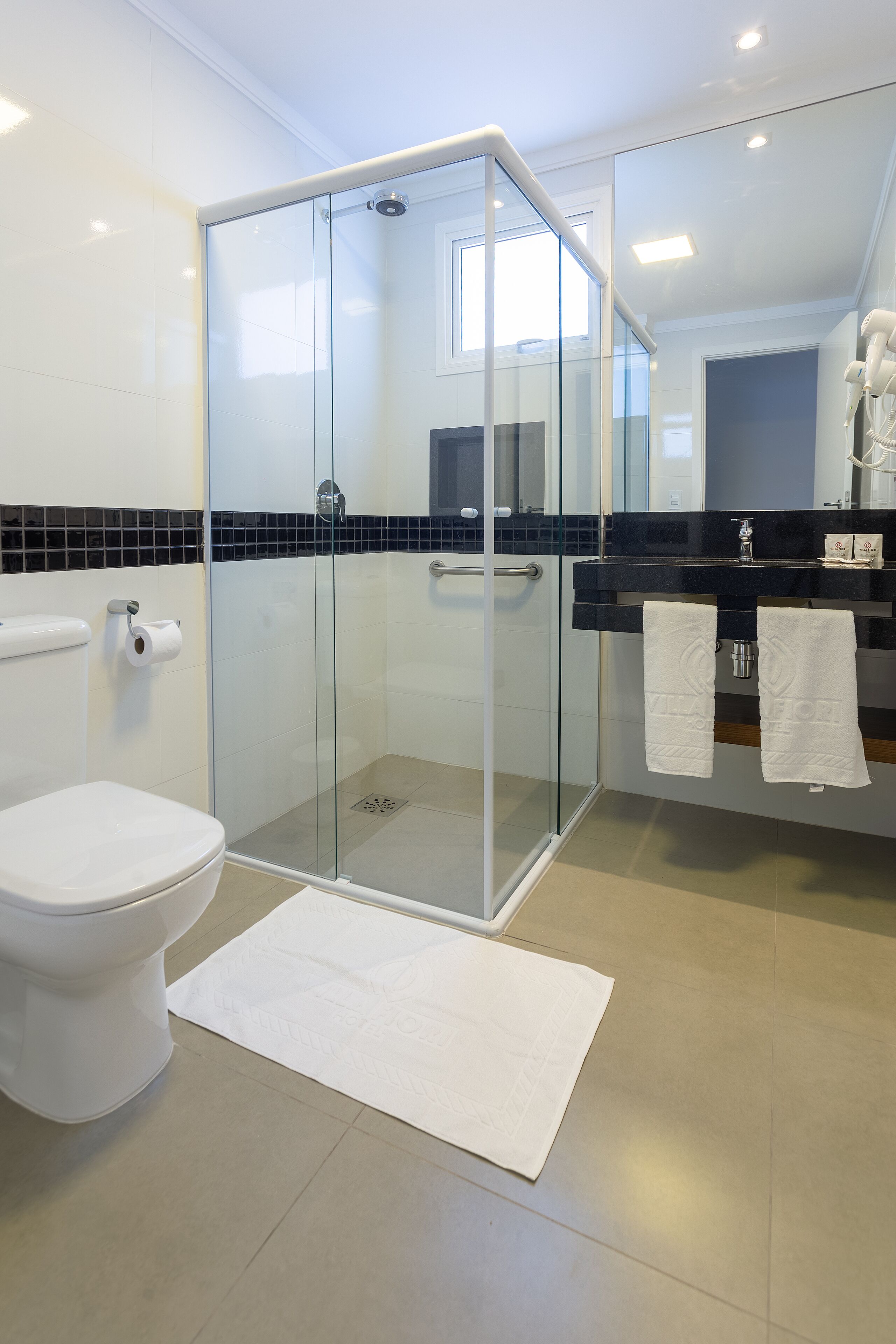 shower, free toiletries, hair dryer, towels