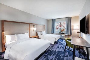 A hotel room with two beds, a desk, a chair, a TV, and a window with curtains. - Fairfield Inn & Suites by Marriott Aberdeen (Aberdeen)