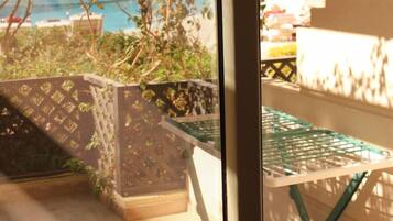 Basic Apartment, 1 Bedroom, Terrace, Pool View | Hypo-allergenic bedding, down duvets, desk, blackout curtains