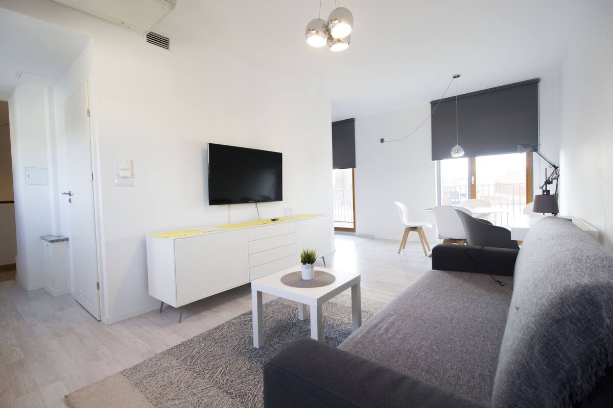 Panoramic Apartment | Living area | 39-inch flat-screen TV with cable channels, TV