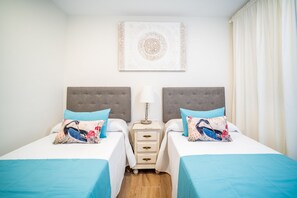 2 dormitorios, tabla de planchar con plancha, wifi y ropa de cama