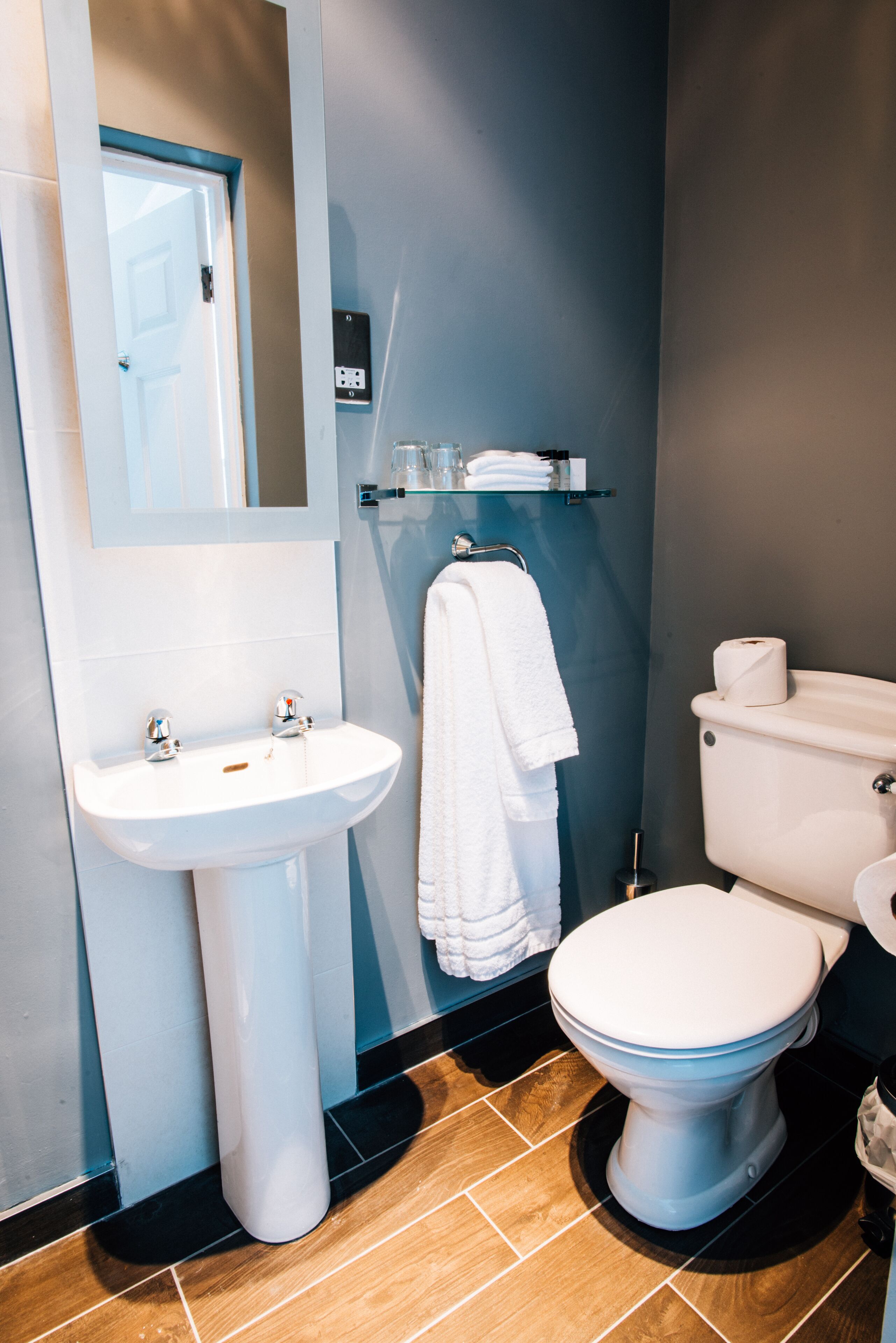 deluxe double room | bathroom | shower, slippers, towels