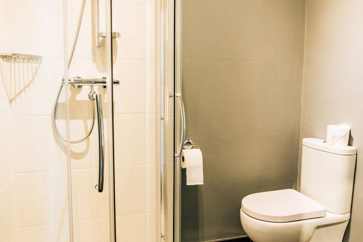 double or twin room | bathroom | shower, slippers, towels