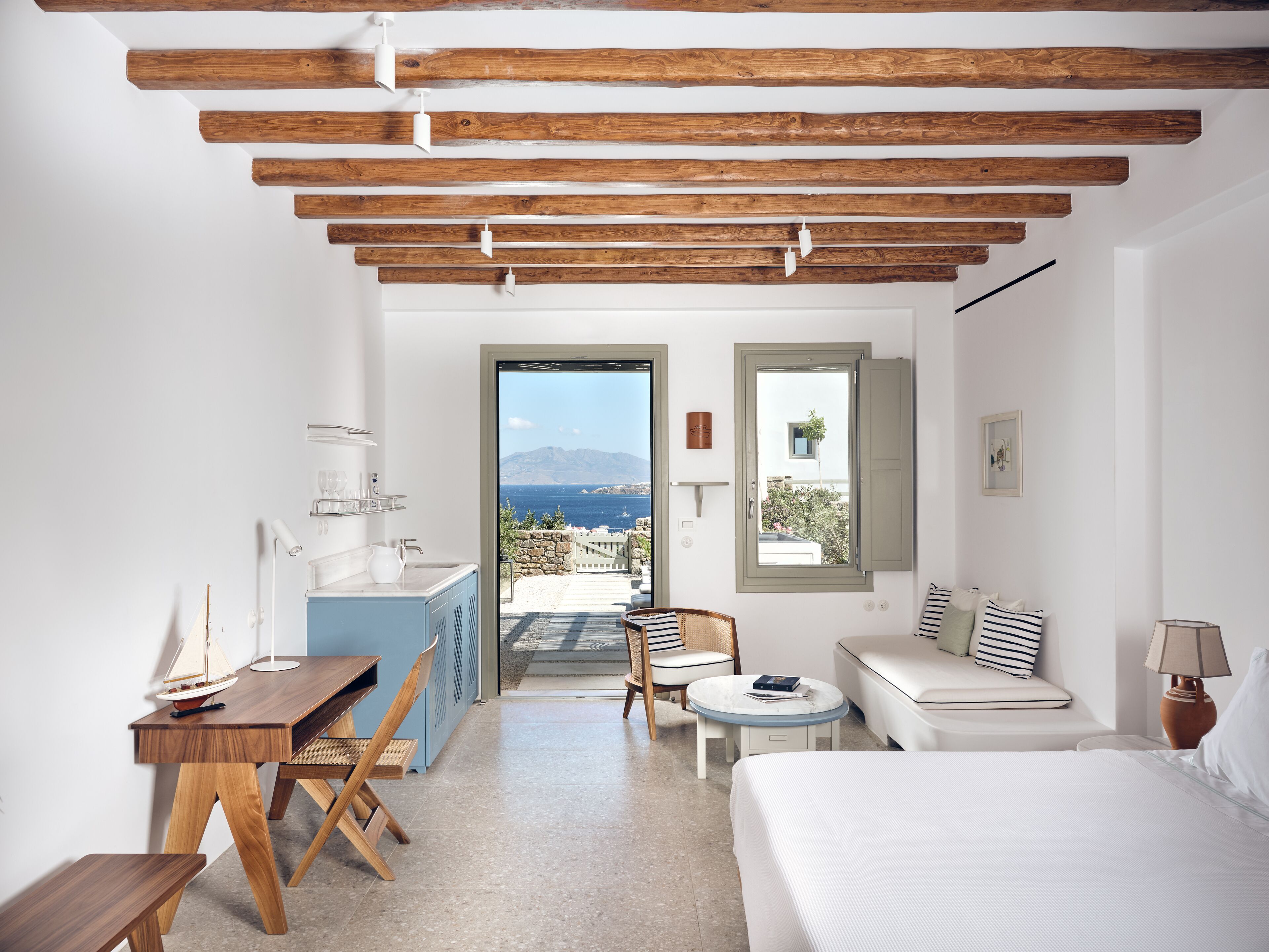 Hilltop Sea View Suite with Private Jacuzzi | 250m from Belvedere Hotel | Shuttle Included | Living area | Flat-screen TV