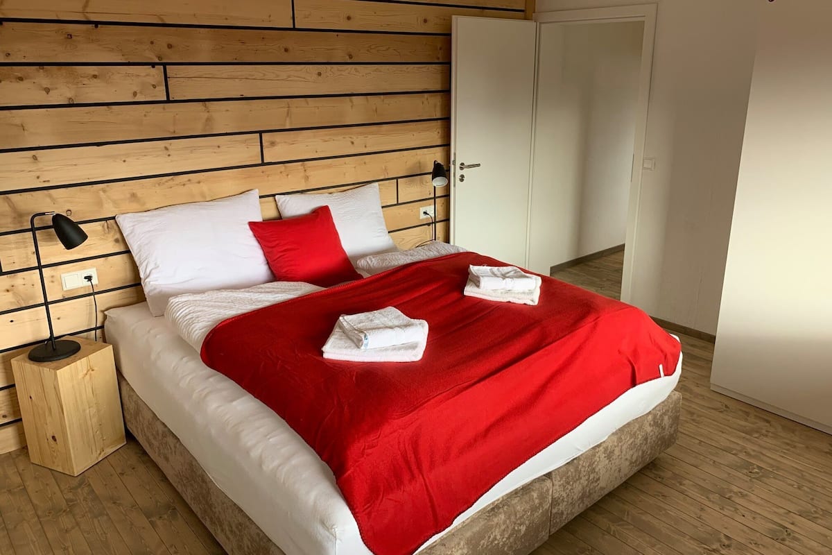 2 bedrooms, blackout curtains, iron/ironing board, free cots/infant beds