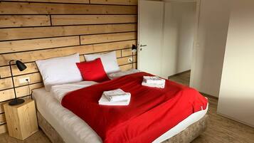 2 bedrooms, blackout drapes, iron/ironing board, free cribs/infant beds