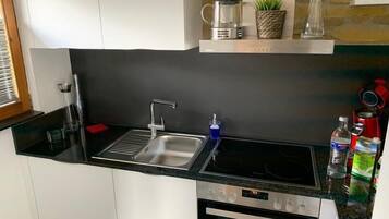 Kondominium Desain, 2 kamar tidur | Dapur pribadi | Lemari es besar, oven, kompor, dan mesin pencuci piring