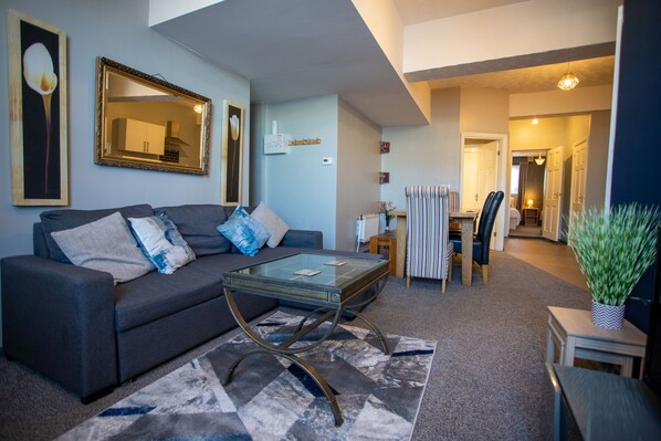 Appartement familial | Aire de séjour | Téléviseur à écran plat