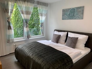 Appartement Deluxe | 2 chambres, rideaux d’obscurcissement, fer et planche à repasser
