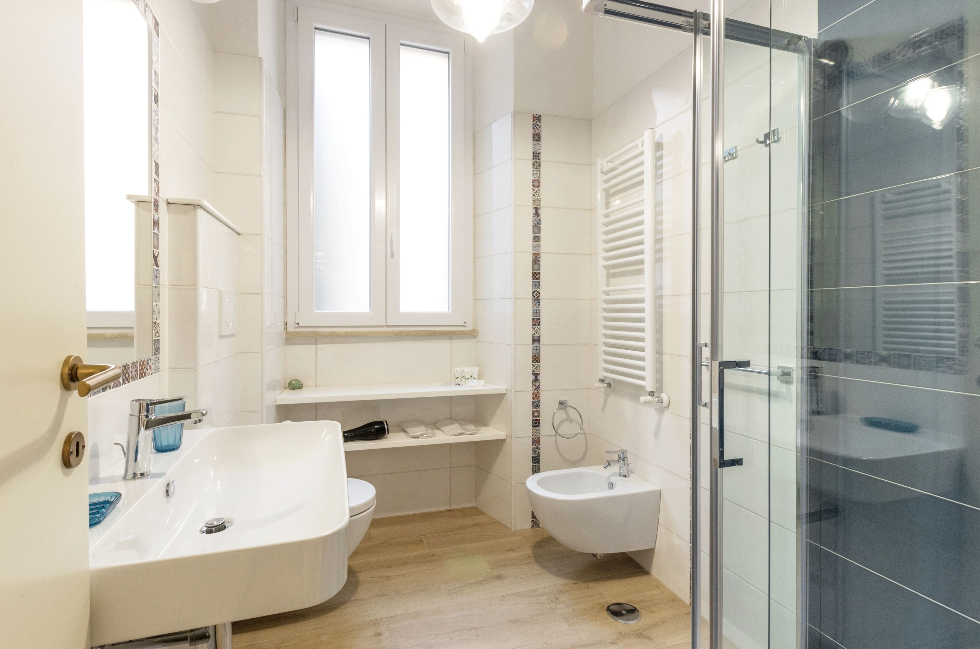 Hair dryer, towels, soap, shampoo