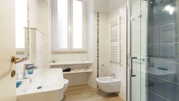 Hair dryer, towels, soap, shampoo