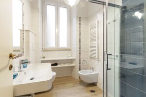 Hair dryer, towels, soap, shampoo