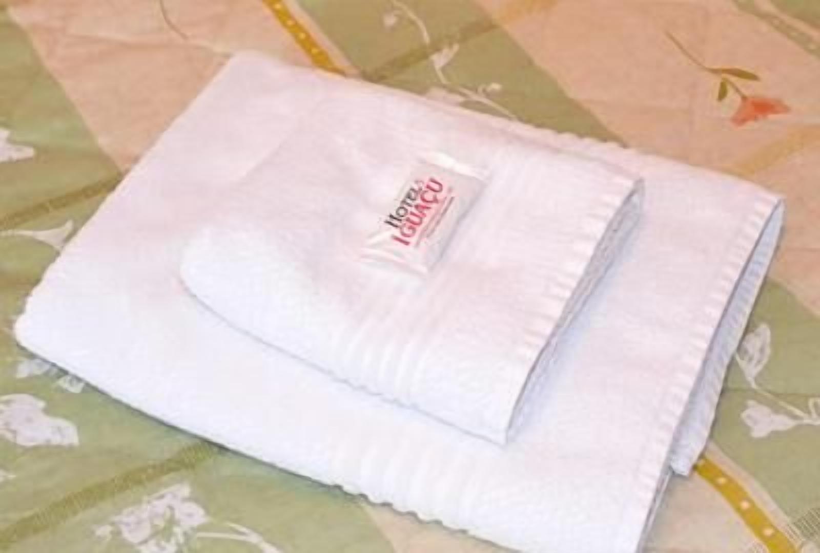 shower, designer toiletries, hair dryer, towels