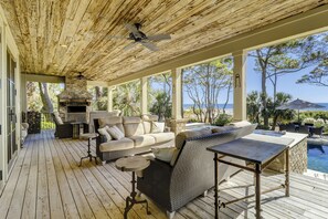 Outdoor dining - 5 bedroom oceanfront home in Sea Pines with a pool & unbeatable views! (Hilton Head Island)