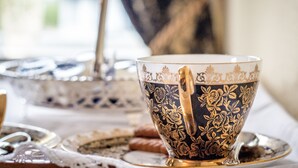 A close-up of a decorative tea set with a cup and saucer. - Altahammond House (Carrickfergus)