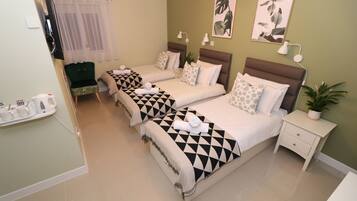 Triple Room | Egyptian cotton sheets, premium bedding, Select Comfort beds