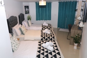 Triple Room | Egyptian cotton sheets, premium bedding, Select Comfort beds