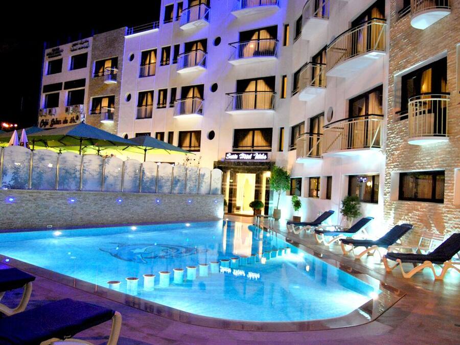 Outdoor pool, open 10:00 AM to 6:00 PM, pool umbrellas, sun loungers