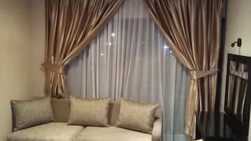 Comfort Studio | Living area | 32-inch plasma TV with satellite channels, TV
