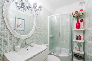Shower, hydromassage showerhead, hair dryer, slippers