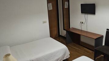 Eenvoudige Twin kamer | Gratis wifi, beddengoed