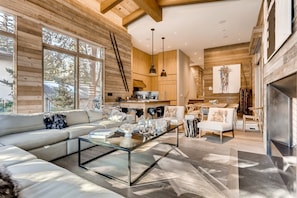 A modern log cabin interior with a living room, kitchen, and dining area. - 184 W Meadow Drive, Vail Village Ultra-Luxury Home - Hot Tub, Ski Storage Next to Gondola 1 (Vail)