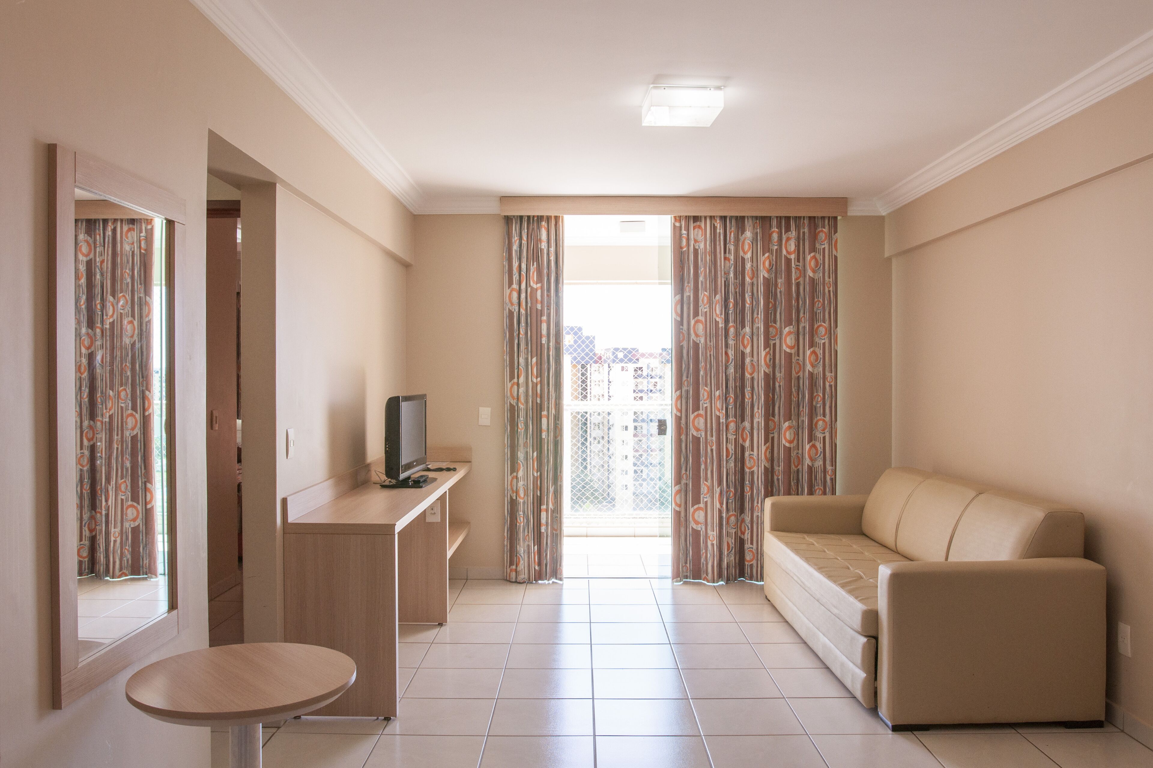 deluxe apartment | living area | lcd tv