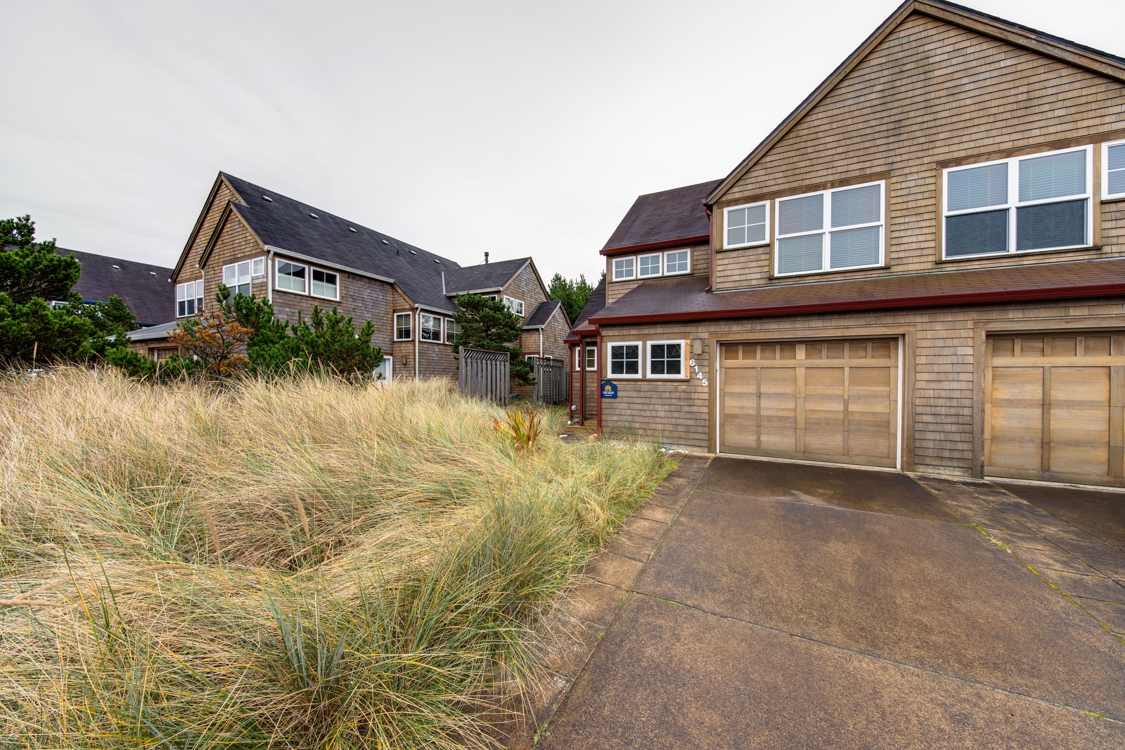 Beautiful, modern home with great beach access, fireplace & outdoor shower