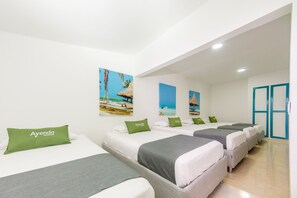 Habitación familiar | Escritorio, wifi gratis, ropa de cama