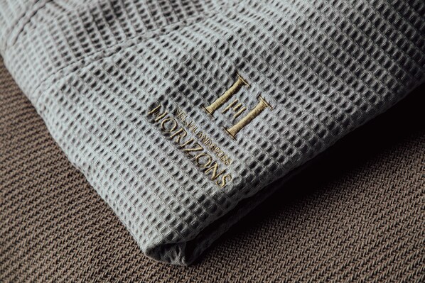 A textured fabric with embossed lettering.
