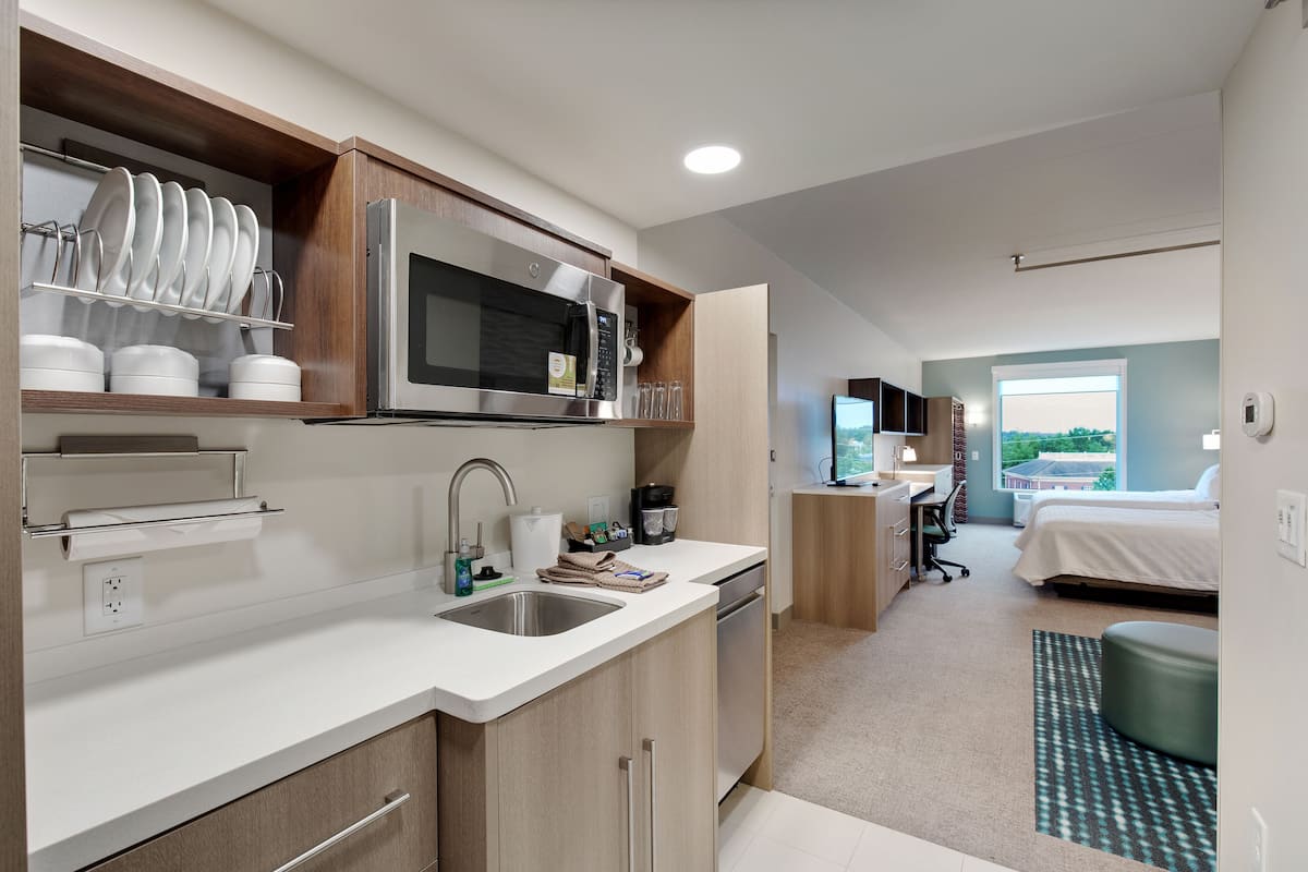 full-sized fridge, microwave, dishwasher, coffee/tea maker