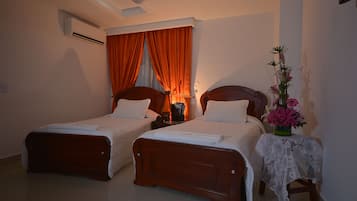 Standard Twin Room | Minibar, in-room safe, free WiFi, bed sheets