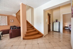 Relax in a comfortable living area with a sofa and coffee table.