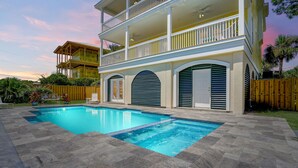 A two-story house with a swimming pool, a balcony, and a wooden fence. - Ocean View 6-Bedroom Beach Haven Sleeps 17 Near North Litchfield (North Litchfield)
