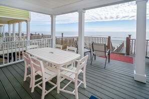 Outdoor dining - Oceanfront 5BR home w/ pool access & beach views near Garden City Pier (Garden City Beach)