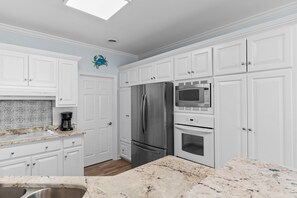Fridge, microwave, oven, stovetop - Oceanfront 7BR Home w/ Beach Access & Stunning Ocean Views (Garden City)