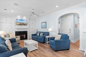TV, fireplace - Oceanfront 7BR Home w/ Beach Access & Stunning Ocean Views (Garden City)