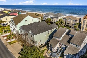 A coastal residential area with houses, a beach, and the ocean. - Ocean View Duplex Near Surfside Pier - 5 Bedrooms, Sleeps 14 (Surfside Beach)
