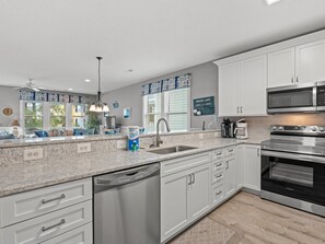 Microwave, coffee/tea maker, cookware/dishes/utensils