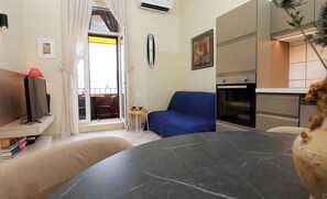City Apartment, 1 Bedroom, Balcony | Living area | 82-cm flat-screen TV with cable channels, TV - Apartments Marmont (Split)
