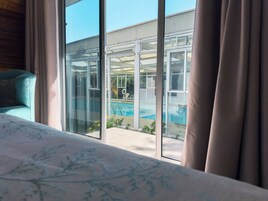 设计客房 | 高档床上用品、羽绒被、迷你吧、客房内保险箱