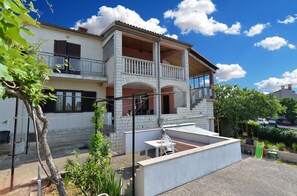 Enjoy a home away from home with a balcony overlooking the surrounding area.