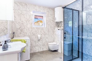 Bathtub, hair dryer