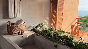 Luxury Room | Bathroom | Shower, hair dryer, towels, soap