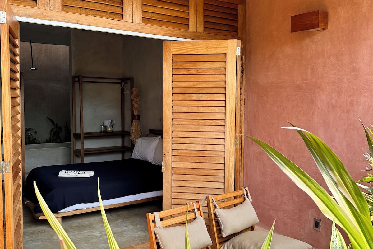 standard room, 1 queen bed, garden view | individually decorated, iron/ironing board, free wifi, bed sheets