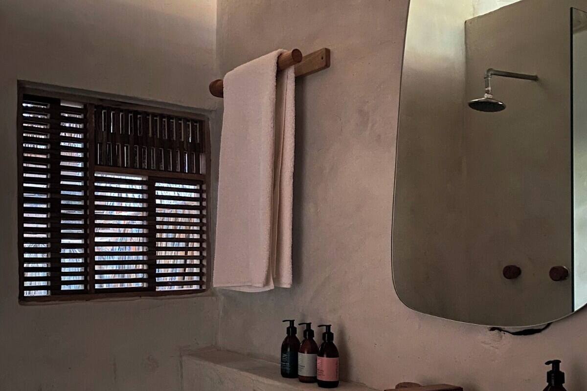 standard room, ocean view | bathroom | shower, hair dryer, towels, soap