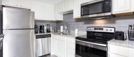 Microwave, dishwasher, coffee/tea maker, cookware/dishes/utensils