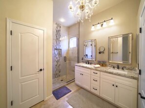 Combined shower/bathtub, hair dryer, towels, soap