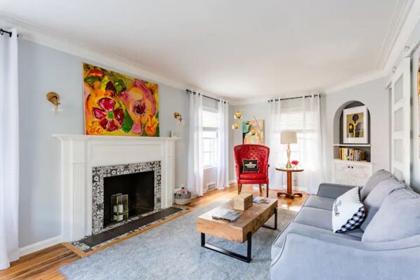 Smart TV, fireplace, table football, books