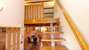 A staircase with wooden railings leading to an upper level. - Apartment 1049/3911 (Istria - Rovinj), 1300m from the beach (Rovinj)